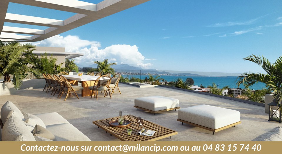 Résidence neuve bord de mer Villeneuve-Loubet — façade contemporaine au coucher du soleil
